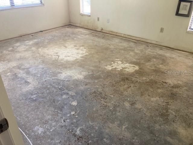 master bedroom with carpet removed