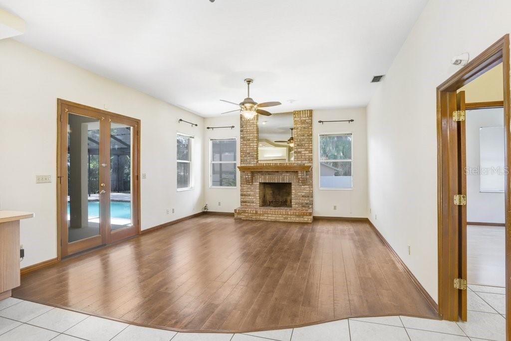 Family Room/Eat in OPEN kitchen with exit to lanai and pool