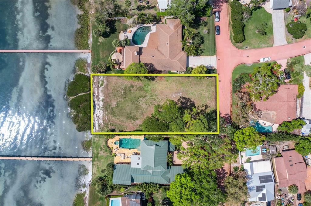 Almost 1/2 acre of land, with 92 feet of waterfront.