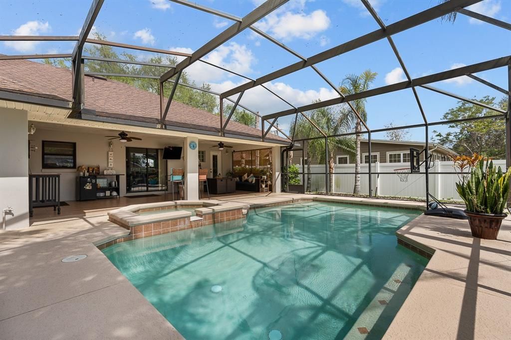 The huge lanai and saltwater pool are a highlight of this home!