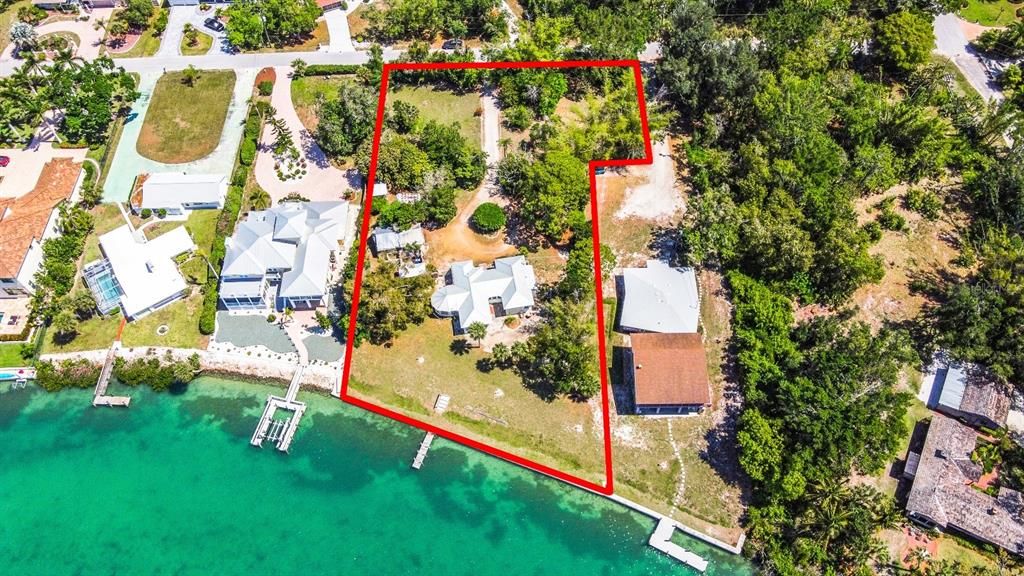 Incredible opportunities like this don't come along very often, 1.13 acres on the bay in pristine Nokomis Florida.