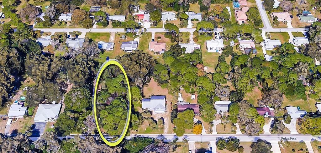 Aerial view of this incredible 1/2 acre lot in sunny Nokomis Florida!