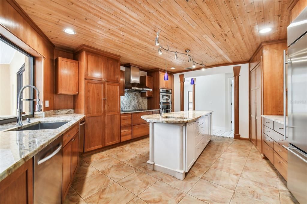 Custom Kitchen has Solid Oak Ceiling and 2 Dishwashers