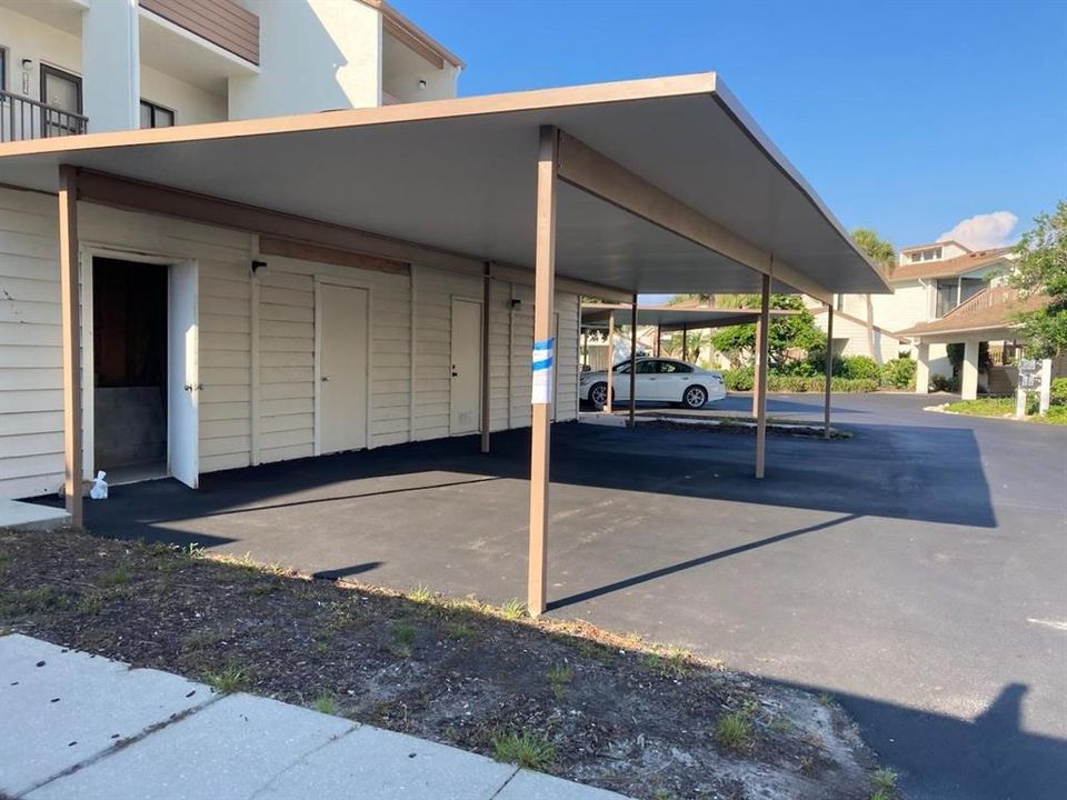 unit comes with brand new carport just installed and storage area