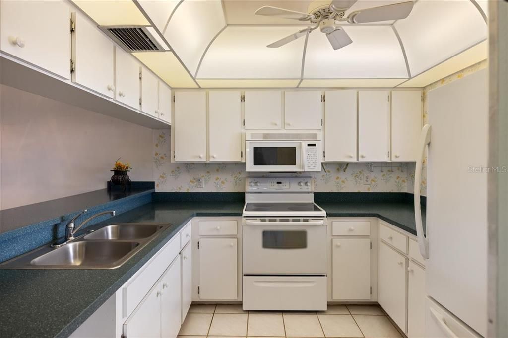 a long spacious lanai with a laundry closet