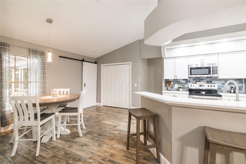 The barn door leads to the spacious 4th bedroom.