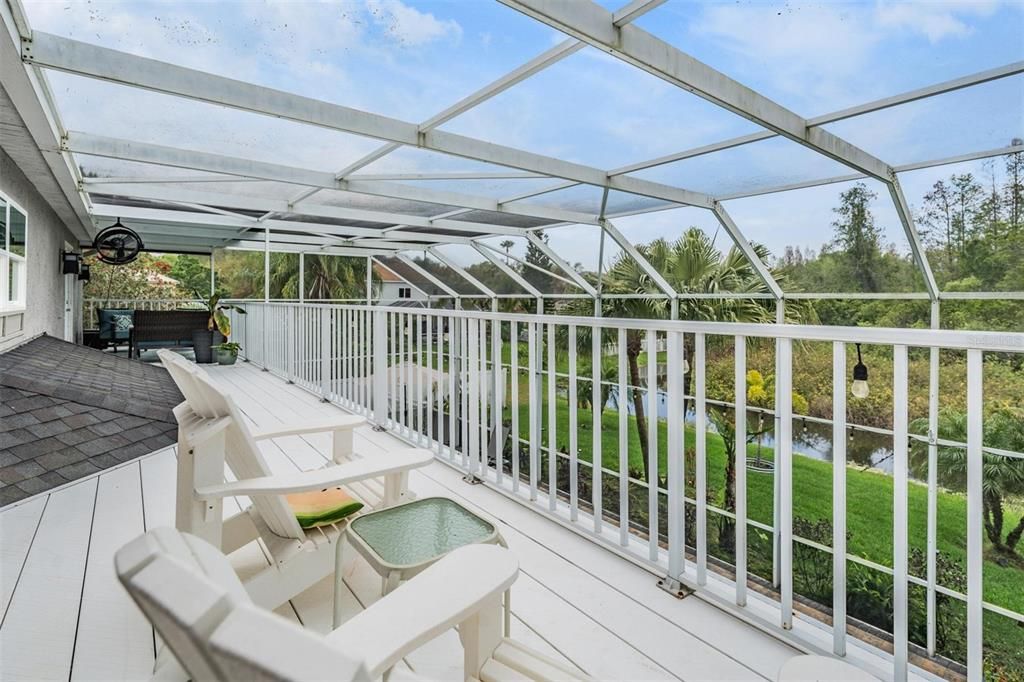 2nd Story Balcony overlooking the pool, pond and conservation lot!