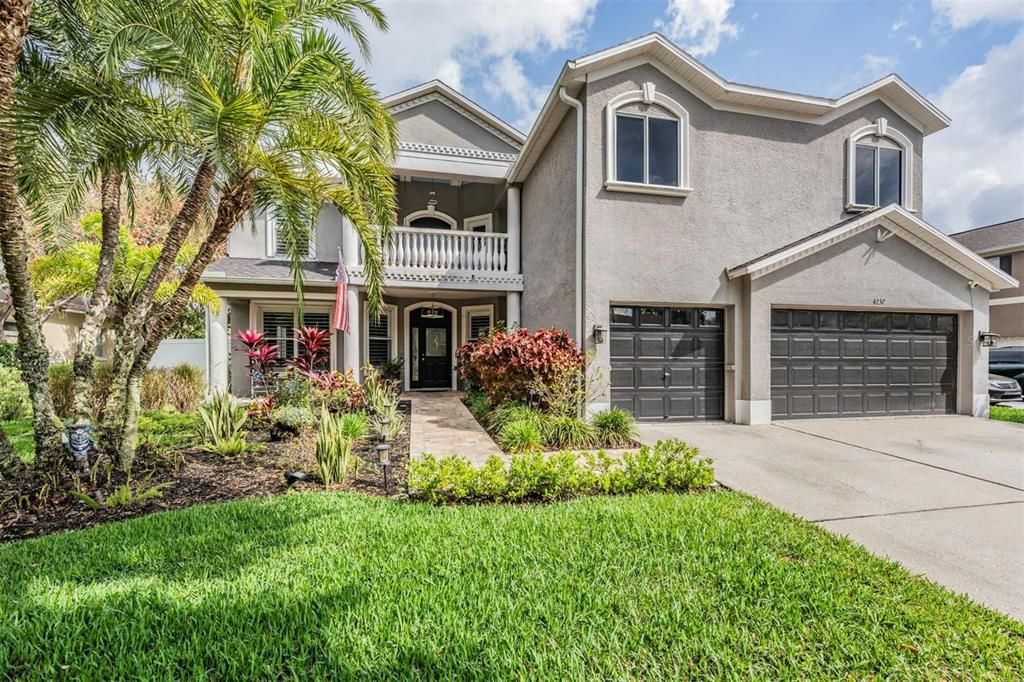 All New landscape with a Brick Paver walkway and porch, almost 3700 sq ft, 5 bedrooms, Loft, Theatre or Bonus Room, Front and Back Balconies, 3 Car Garage, Saltwater Pool, Pavered Lanai, Partial Privacy Fence, Conservation and Pond views!