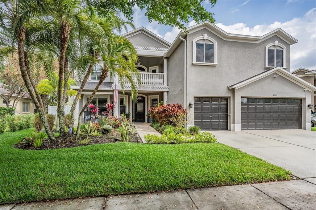 Completely re-landscaped with a Brick Paver walkway and porch, almost 3700 sq ft, 5 bedrooms, Loft, Theatre or Bonus Room, Front and Back Balconies, 3 Car Garage, Saltwater Pool, Pavered Lanai, Partial Privacy Fence, Conservation and Pond views!