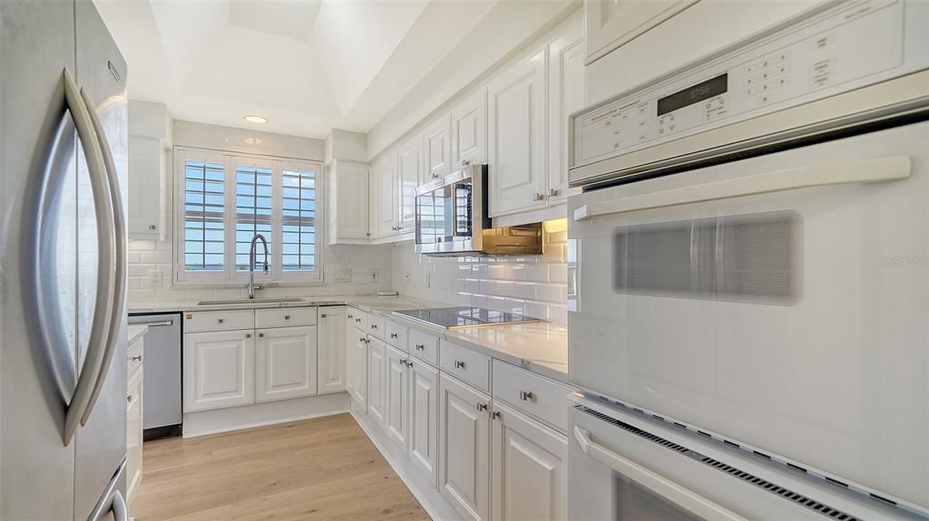 Kitchen with Bay and golf course views