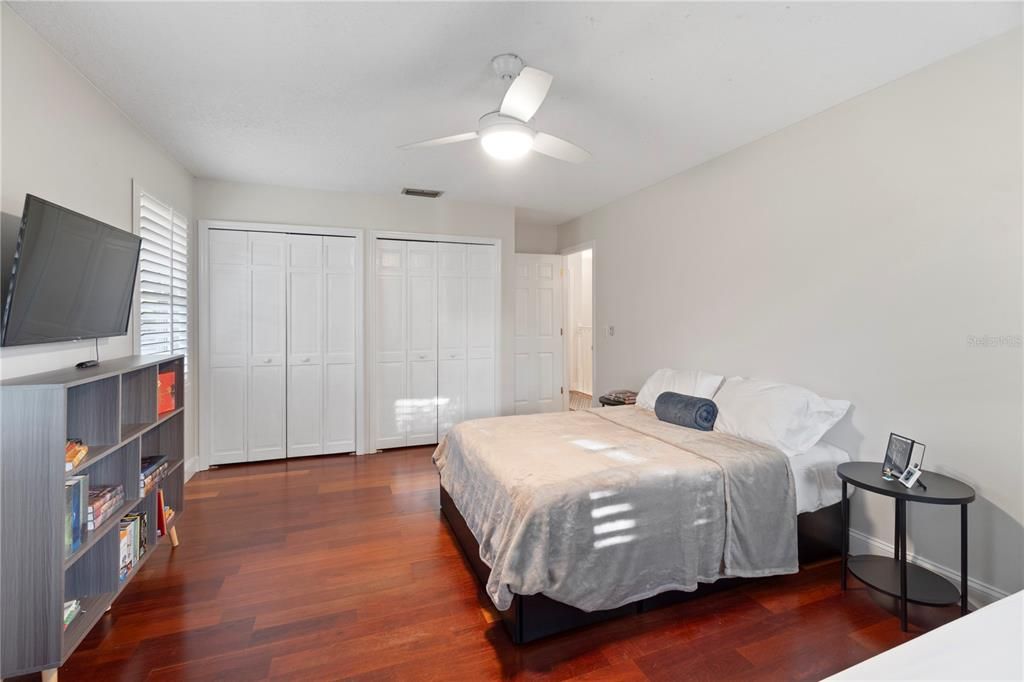 Bedroom 3 showcases engineered hardwood floors and bright walls, providing a blank canvas for any new homeowner to personalize and make their own.