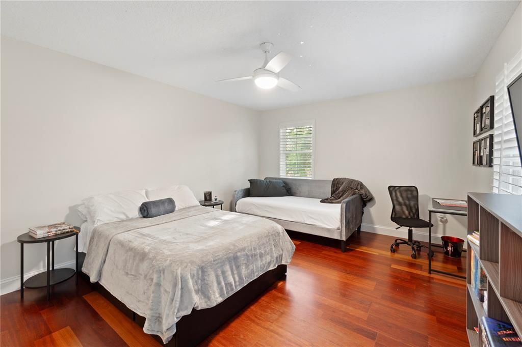 Bedroom 3 showcases engineered hardwood floors and bright walls, providing a blank canvas for any new homeowner to personalize and make their own.