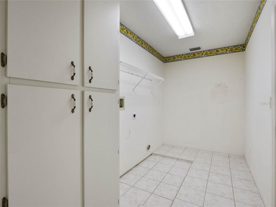laundry room, located off garage entrance