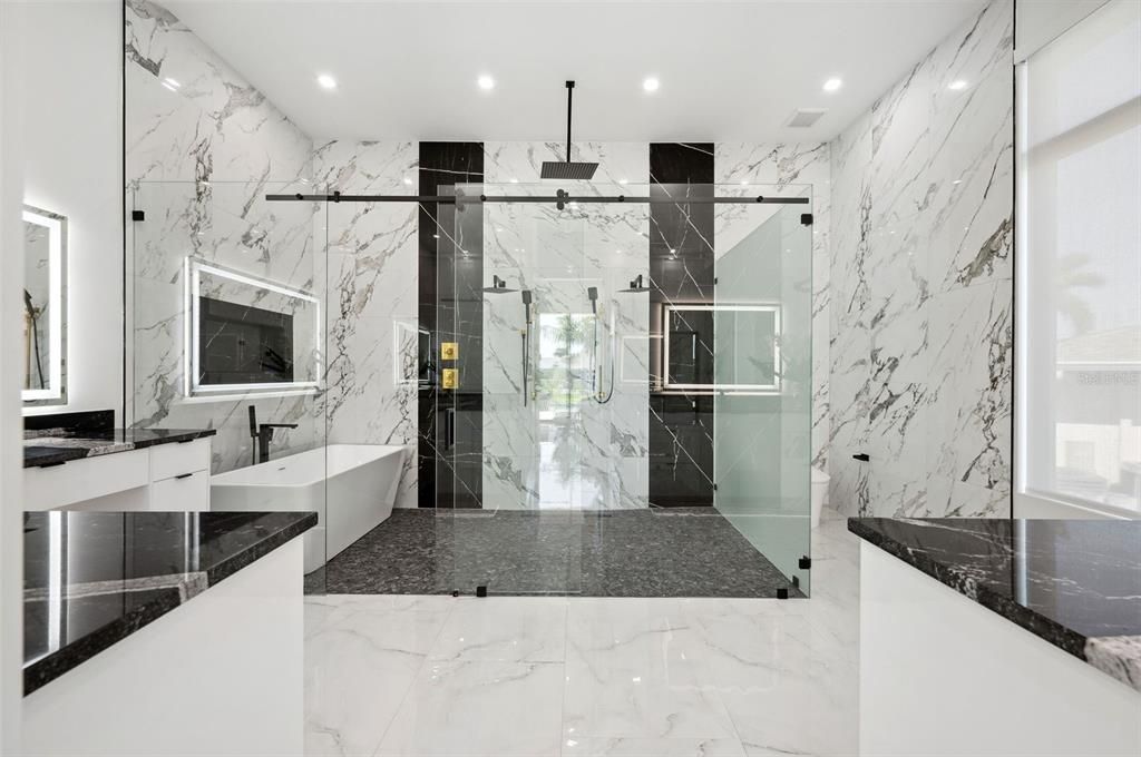 Master Bath Wet Room with Soaking Tub and Dual Showers