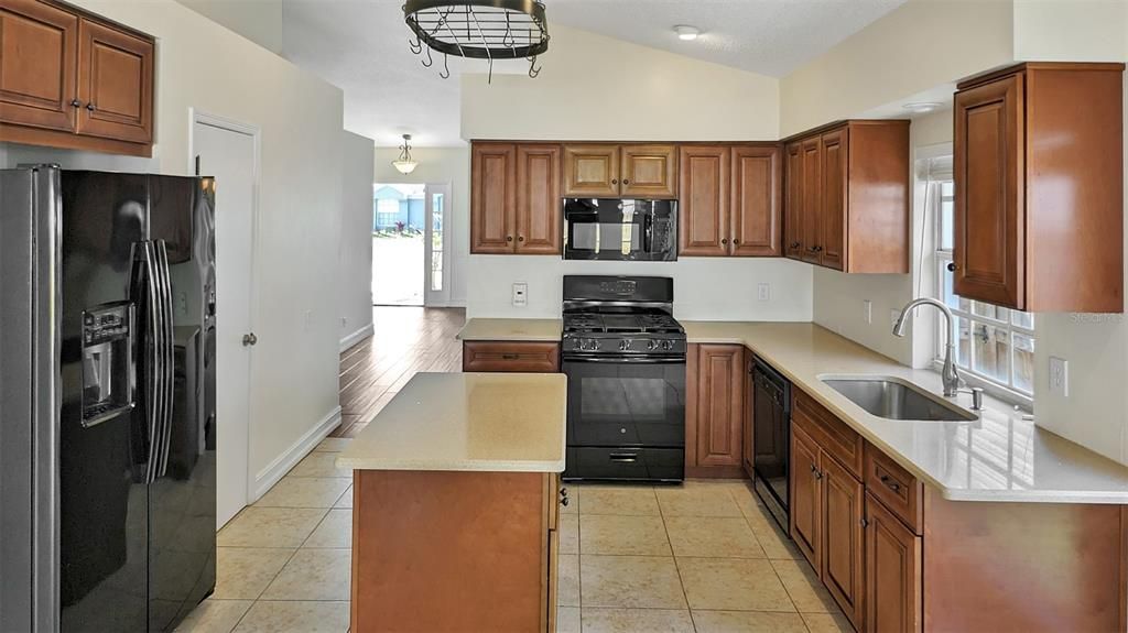 Remodeled Kitchen, View #2! Renovated NEW KITCHEN with an Island Counter and New GAS STOVE and Appliances Will save you money, as you will be wanting to Eat in Every night!