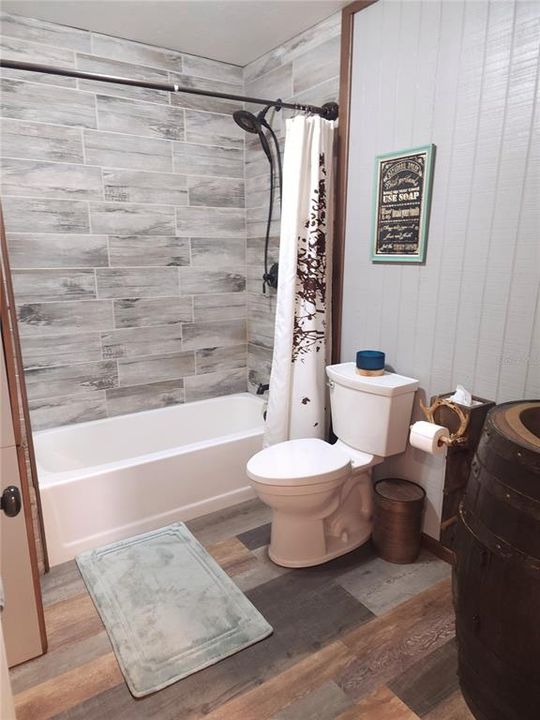 Tiled walls and bench in shower