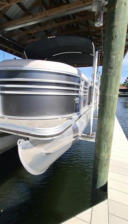 6000lb boat lift. Boat available as separate purchase.