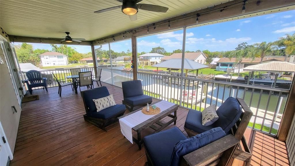 Enjoy amazing views and amazing breezes on this generous screened porch
