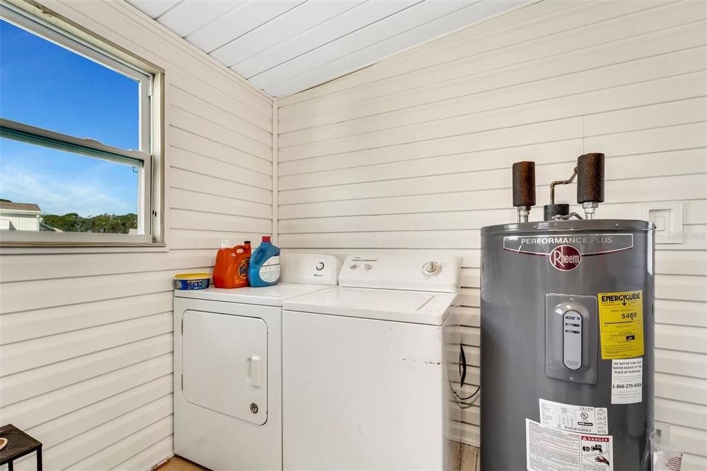Laundry room in outside storage shed