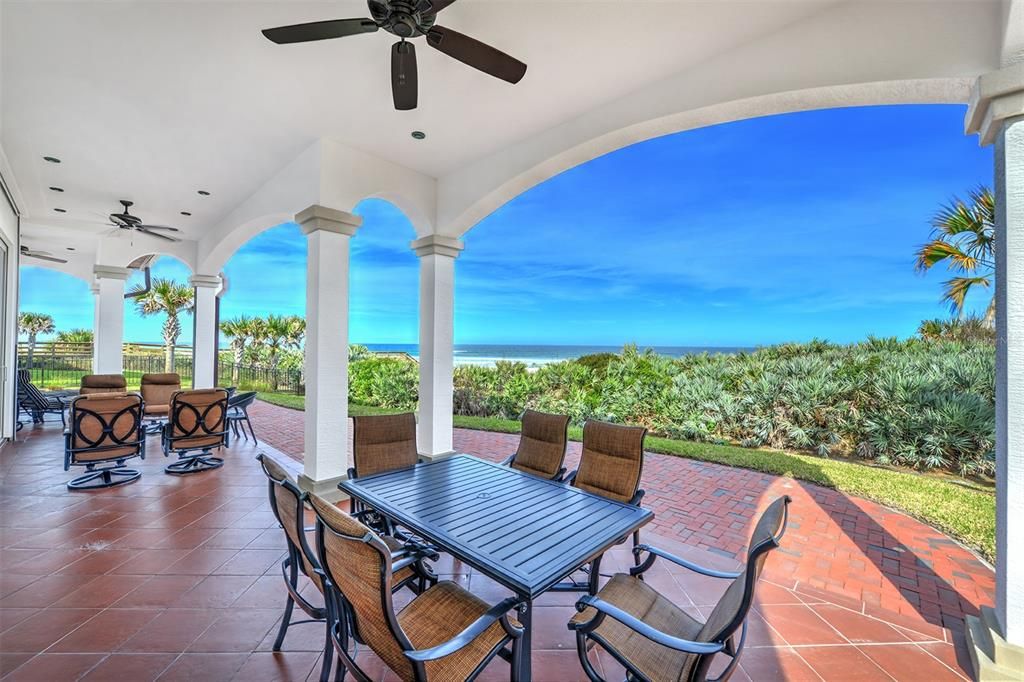 1st Level covered porch with oceanfront views from main living areas