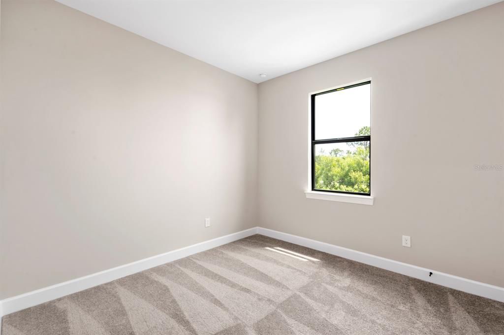 Enjoy uninterruped long lake views from your brand new 2024 home!