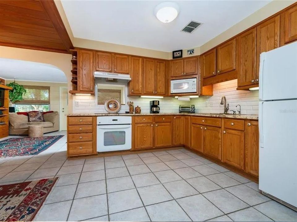 Kitchen with view of Florida room