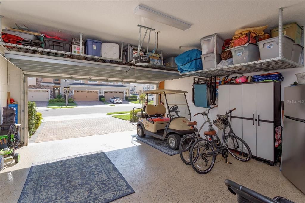 2 car garage featuring storage system.