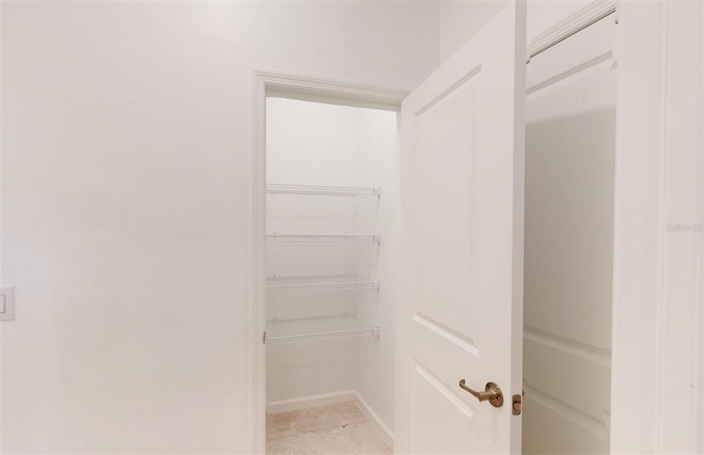 Main bath linen closet open