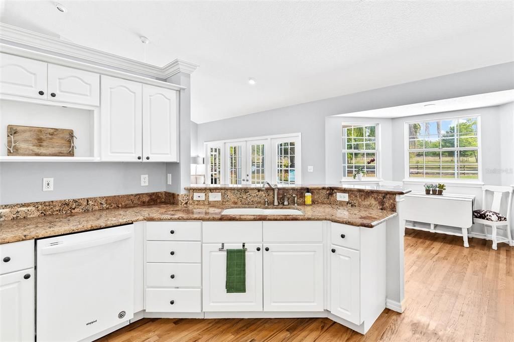 Kitchen with view of pool area