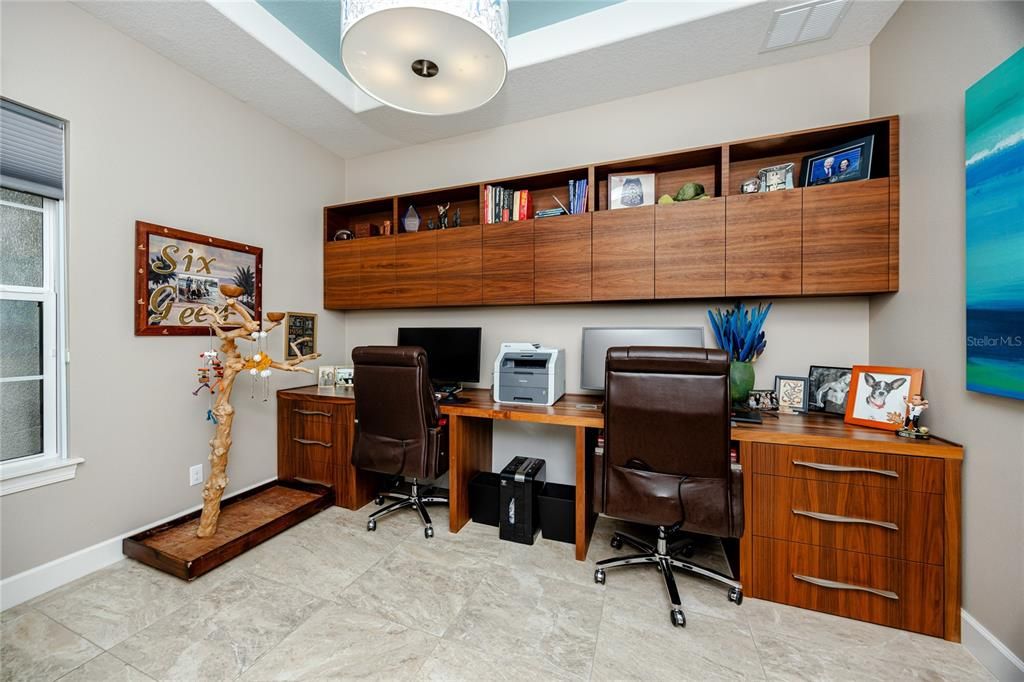 Office/Den with Custom Walnut Built In Desk and Cabinets