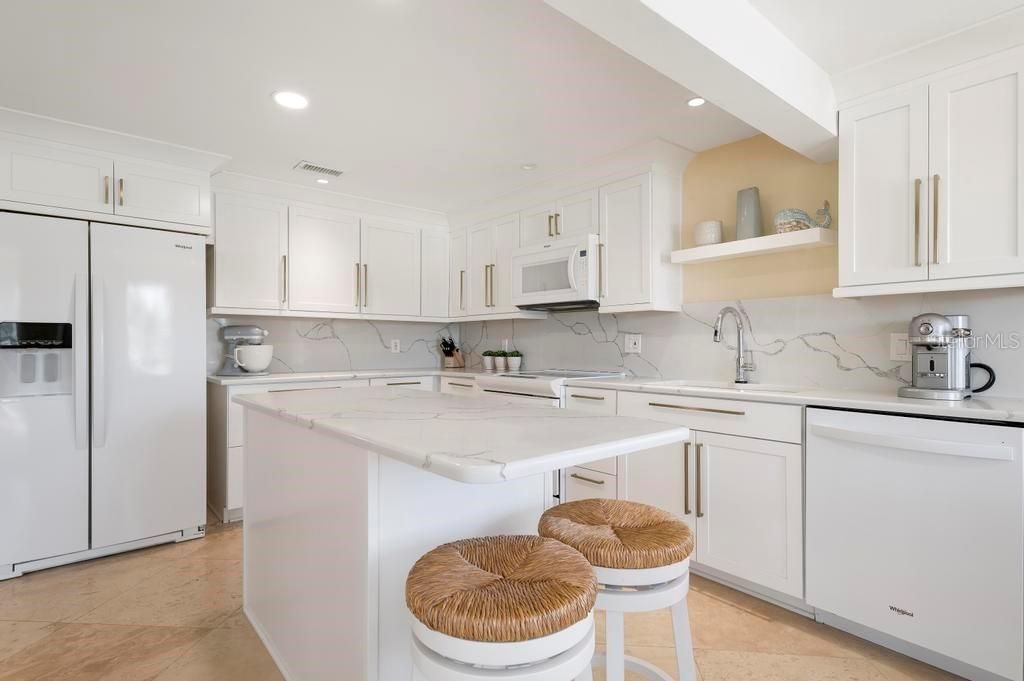 Remodeled kitchen with quartz counter tops