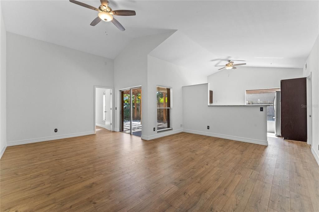 Open floor-plan with vaulted Ceilings in the common areas bring in the natural light.