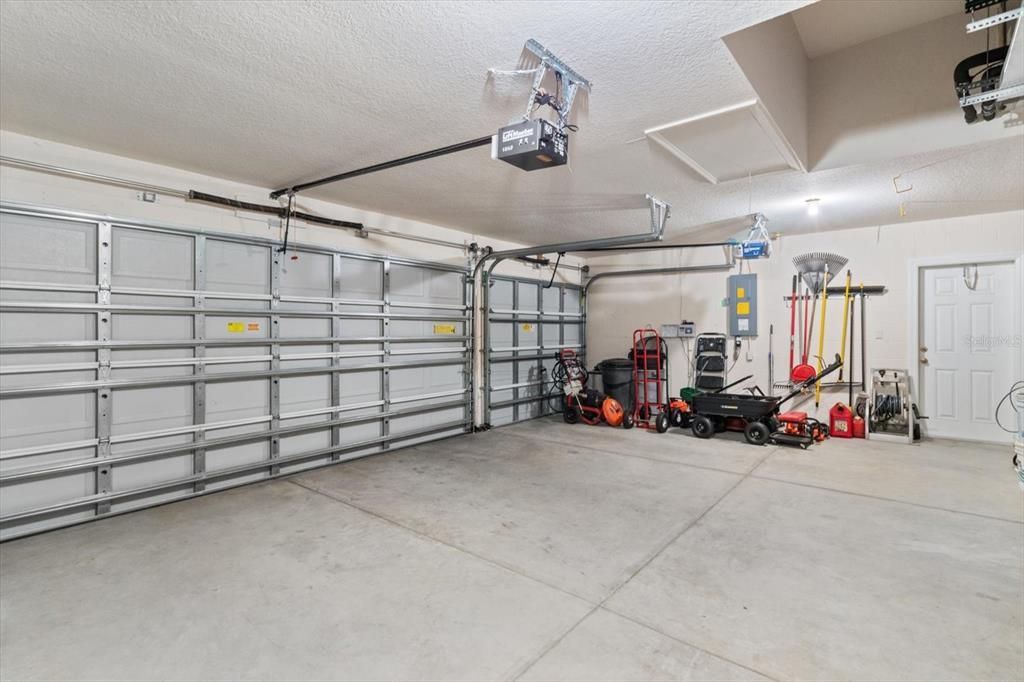 3 Car Garage w/ Garage Door Openers, Recessed Air Handler & Pull Down Stairs for Storage Access