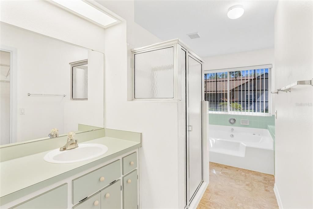 Primary Bathroom with Separate Shower and Bath