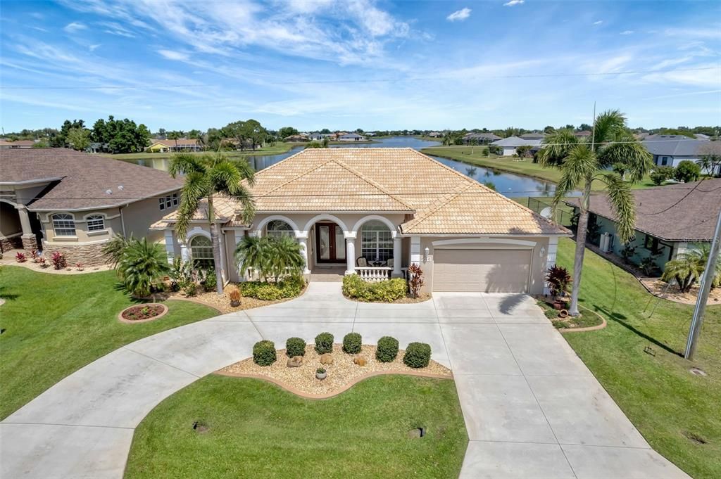 DON'T LET THIS LUXURIOUS HOME GET AWAY!  IT IS FLORIDA LIVING AT ITS VERY BEST!