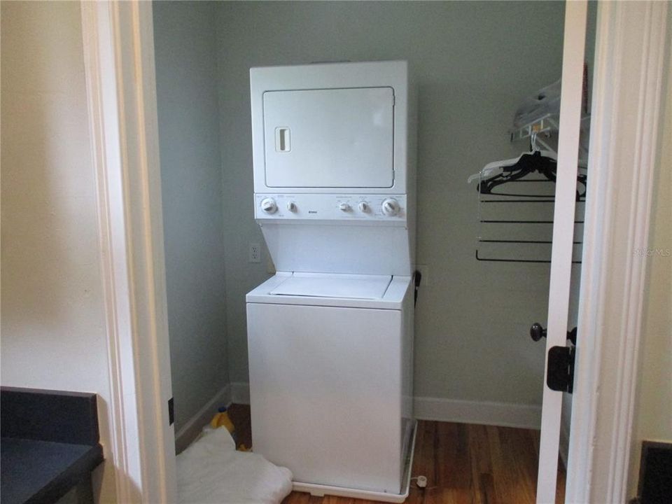 Utility room with washer and dryer.  Unit 230.