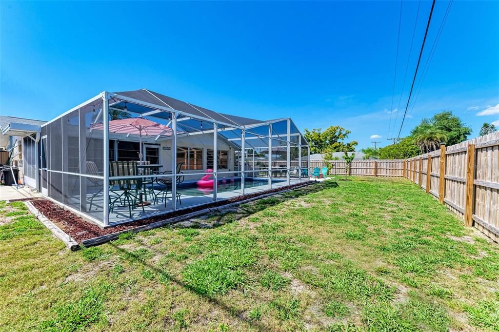 fenced in yard for playing or pets