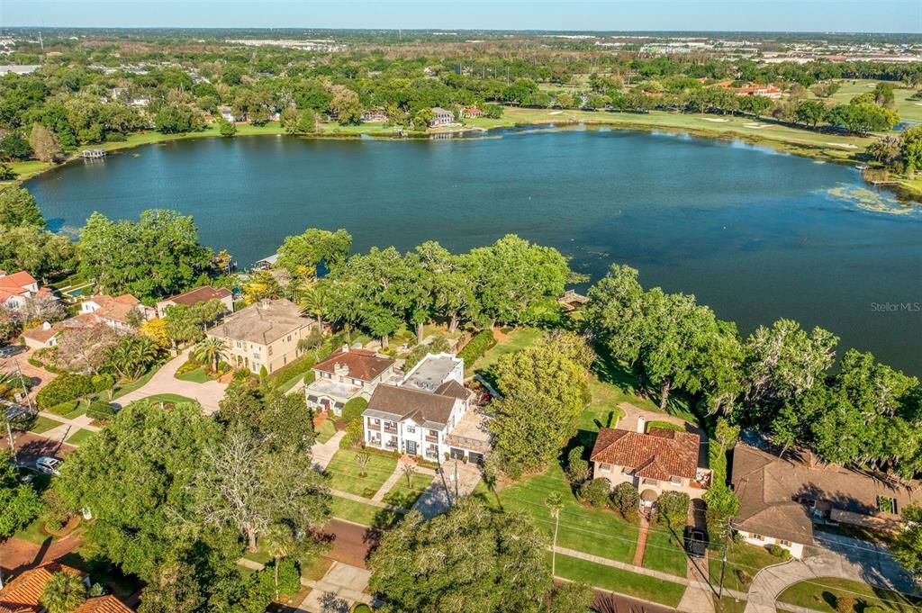 Over 1/2 acre estate on Spring Lake in College Park.