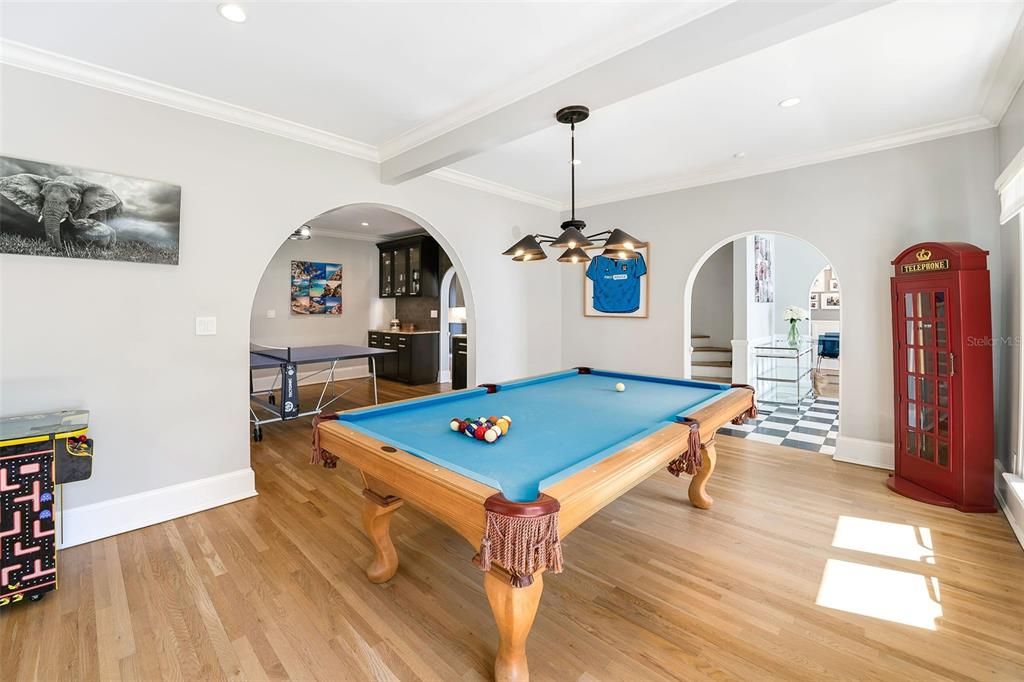 Open to the foyer this 12'x19' pool table room has also been used for formal living.