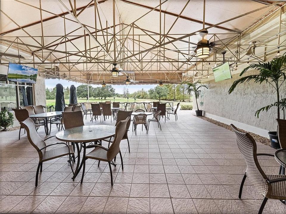 Clubhouse features a Restaurant & Patio with distant Golf Course Views