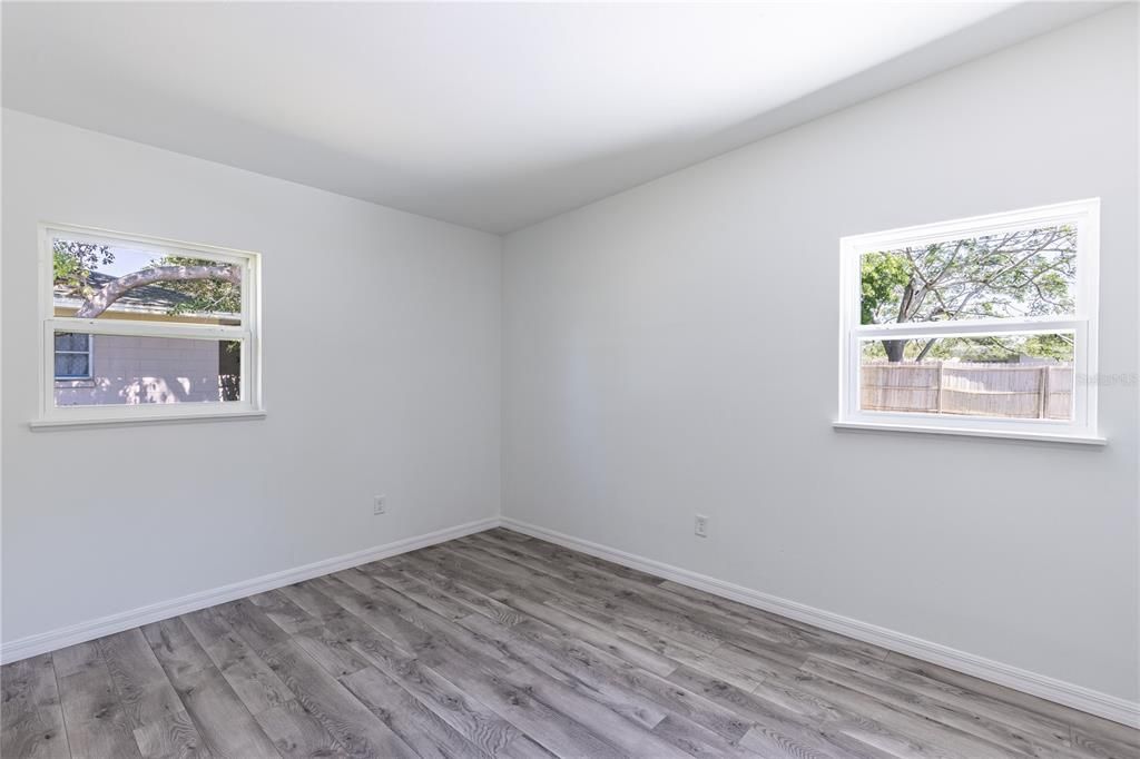 PRIMARY BEDROOM WITH A WALKIN CLOSET