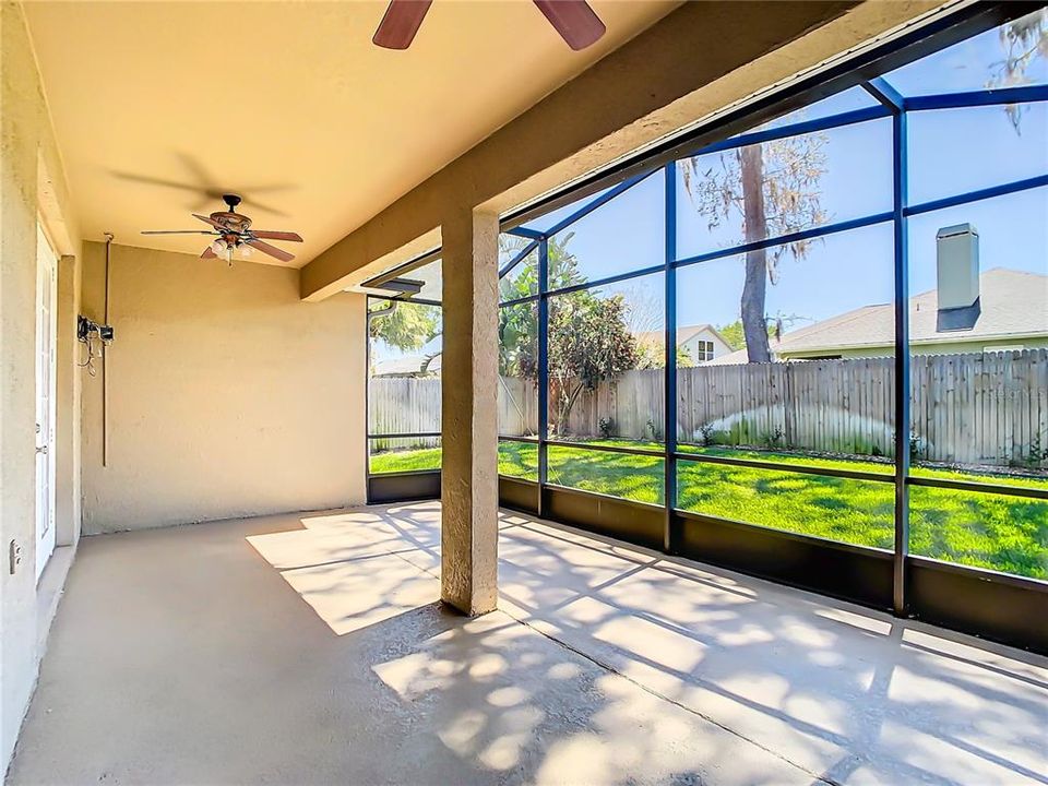 Large extended Patio opens to private landscaped back yard.