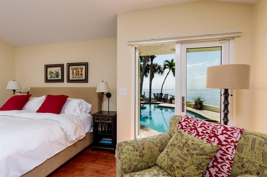 Primary Bedroom -glass doors to pool