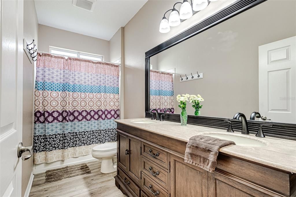 Guest Bath with dual vanities and bath/shower combo