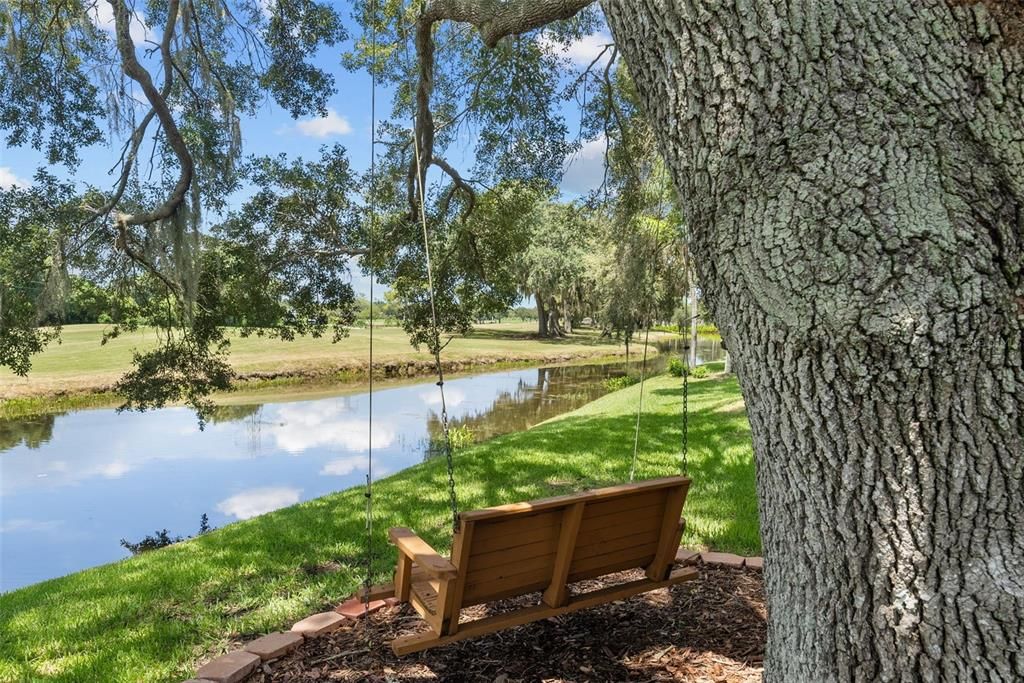 Your own private bench set under a lovely mature tree overlooking golf course - the owner has sipped many cool drinks here while watching the sun set.  One of her favorite spots.