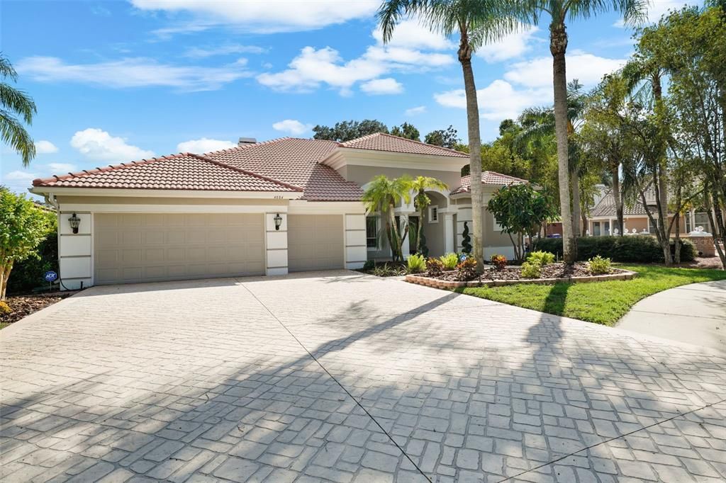 Another view of front exterior of MARC RUTENBERG custom executive-style home