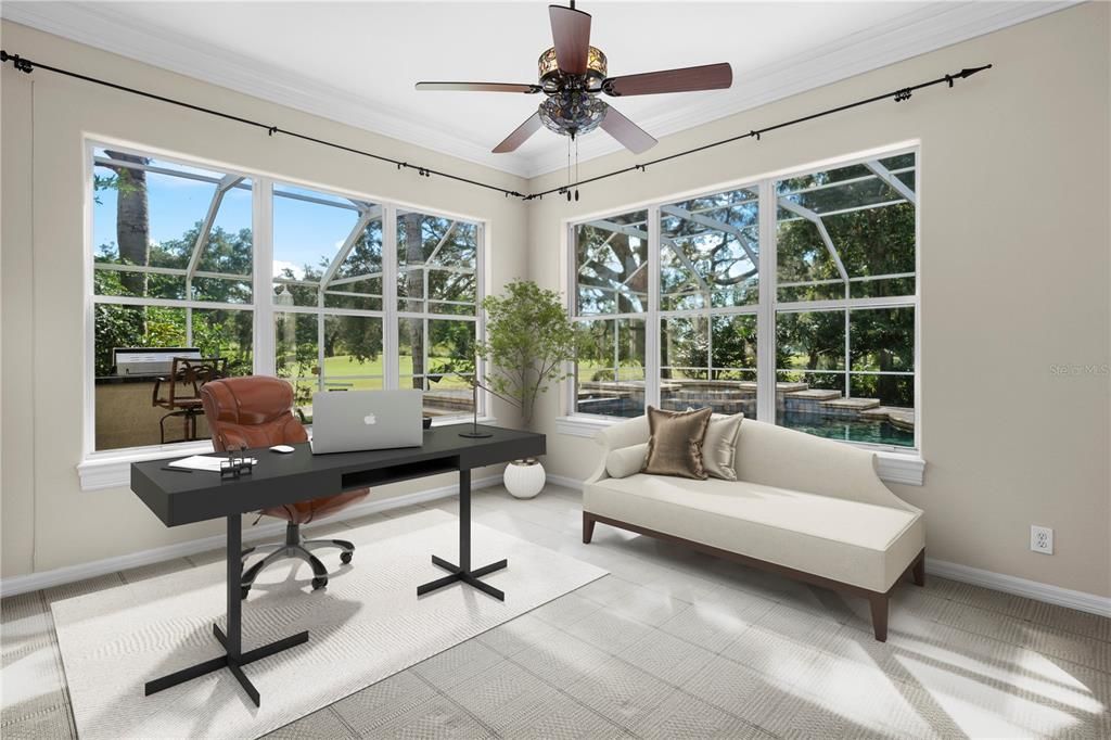 STAGED - Home office/bonus room view of golf course and pool.