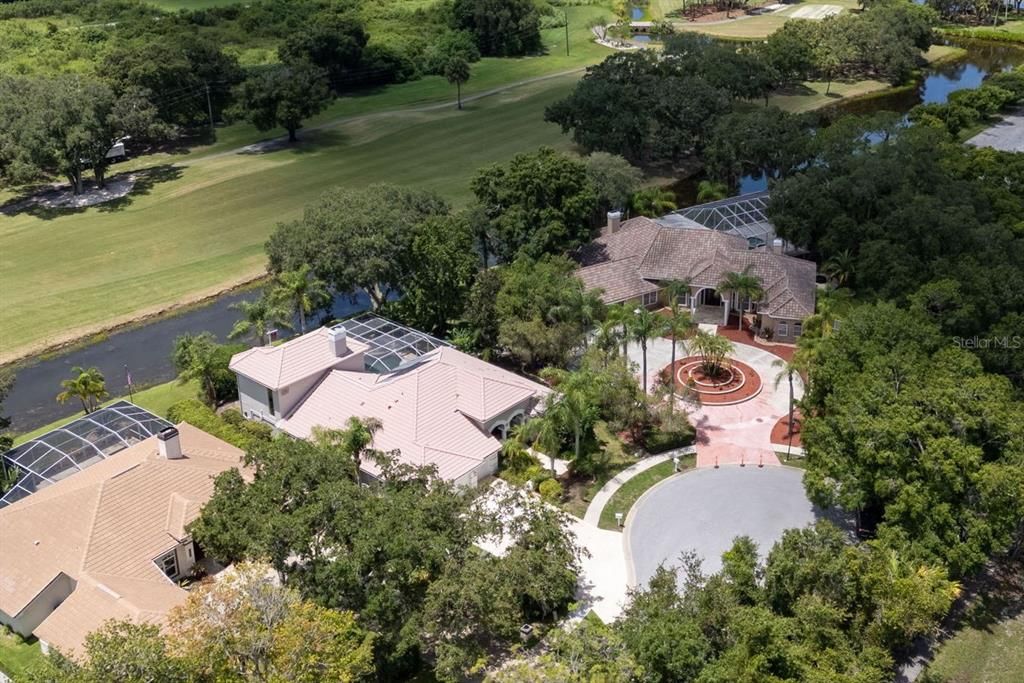 Aerial view of home and private cul-de-sac - home is perfectly positioned for low traffic and ultimate privacy.  Friendly HOA and neighborhood!