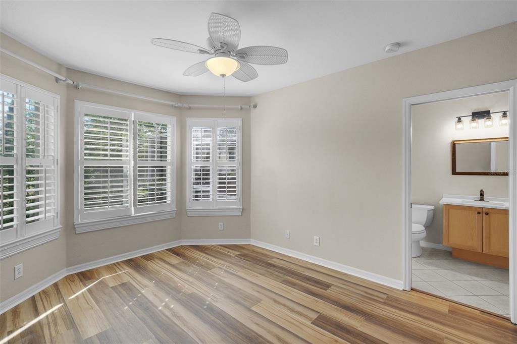 Bedroom 4 tucked away in back corner of home with golf course view - adjacent to Bath 3 (pool bath) - great guest suite set-up!