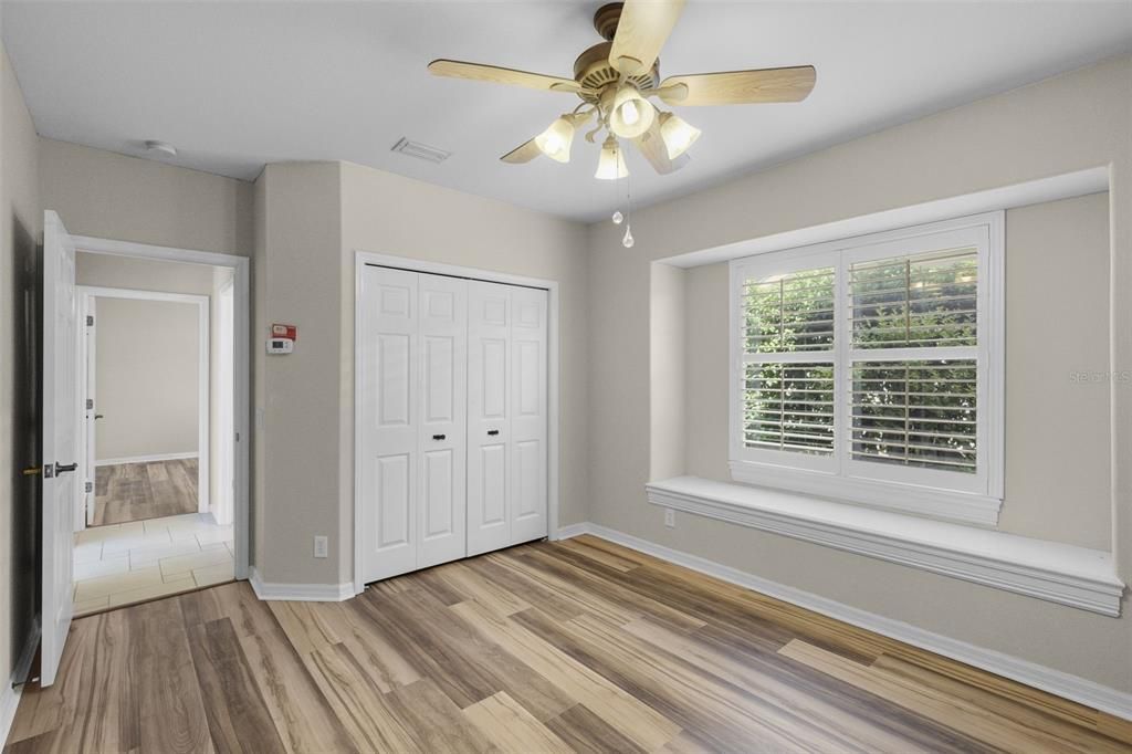 Bedroom 3 w/custom built-in bench (Marc Rutenberg signature detail), looking toward Bedroom 2